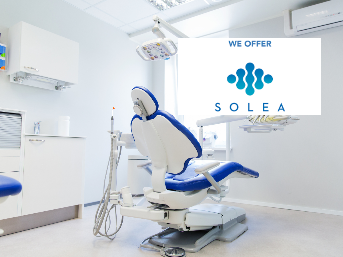 Solea dentist performing laser treatment at Country Dental Fergus